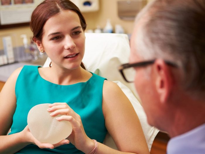 Breast reconstruction options include breast implants or tissue grafting.